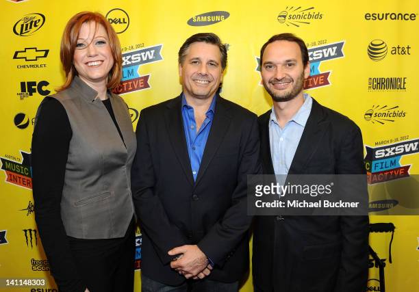 Producer Tricia Nolan, director and celebrity photographer Kevin Mazur and producer and celebrity photographer Jeff Vespa arrive to the world...