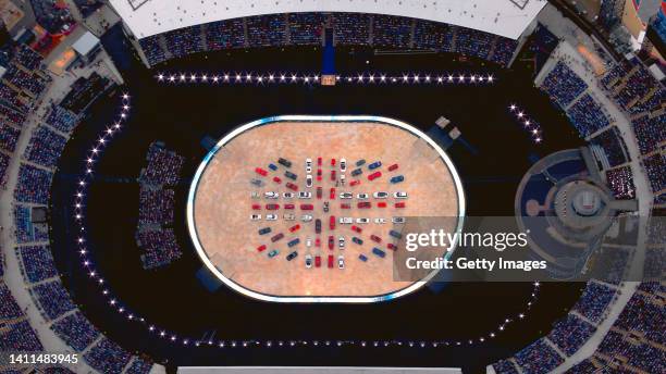 Cars come together to create the flag of Great Britain during the Opening Ceremony of the Birmingham 2022 Commonwealth Games at Alexander Stadium on...