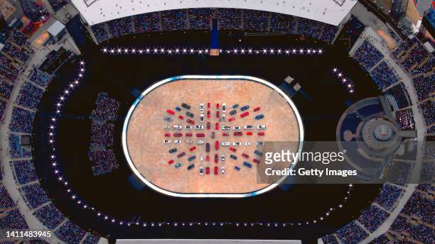 Cars come together to create the flag of Great Britain during the Opening Ceremony of the Birmingham 2022 Commonwealth Games at Alexander Stadium on...