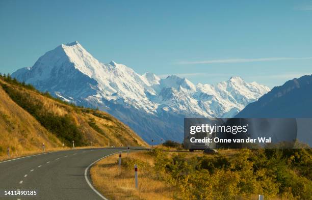 camper van stopped on scenic road - caravan new zealand stock pictures, royalty-free photos & images