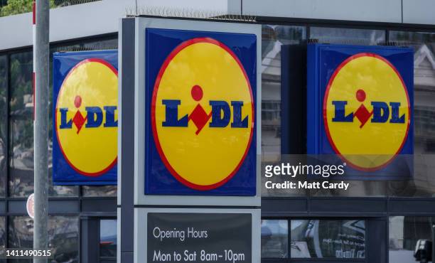 The Lidl logo is displayed outside a branch of the supermarket retailer Lidl on May 31, 2022 in Penzance, England. The German discount retailer chain...