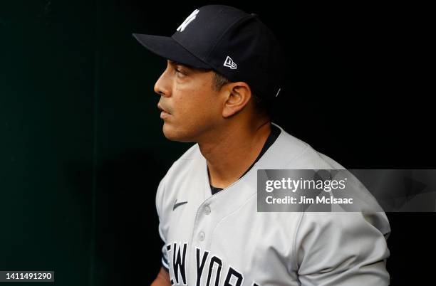 Third base coach Luis Rojas of the New York Yankees looks on before a game against the New York Mets at Citi Field on July 27, 2022 in New York City....