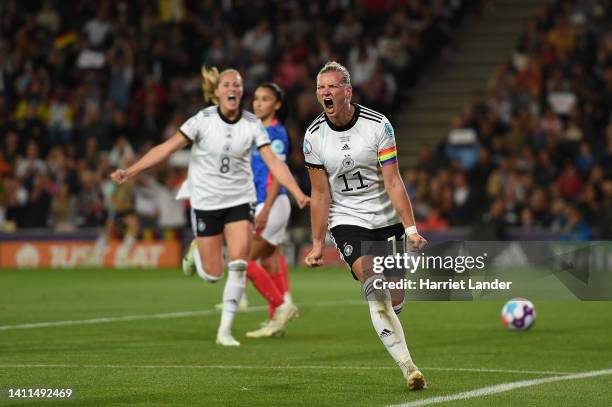 Alexandra Popp of Germany celebrates after scoring her team's second goal during the UEFA Women's Euro England 2022 Semi Final match between Germany...