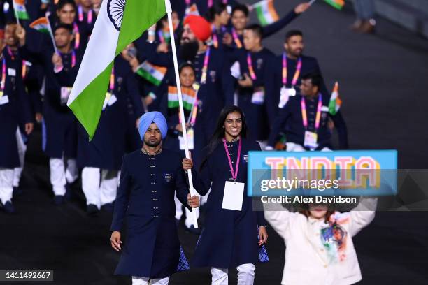 Manpreet Singh and P.V. Sindhu, Flag Bearers of Team India lead their team out during the Opening Ceremony of the Birmingham 2022 Commonwealth Games...