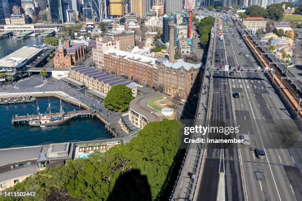 aerial view of circular quay, cahill expy and city of sydney - driving car australia road copy space sunlight travel destinations colour image day getting stock pictures, royalty-free photos & images