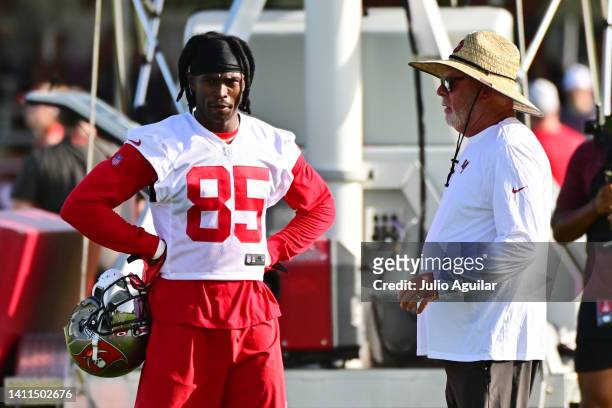 Julio Jones of the Tampa Bay Buccaneers talks with Bruce Arians during the 2022 Buccaneers Training Camp at the AdventHealth Training Center on July...