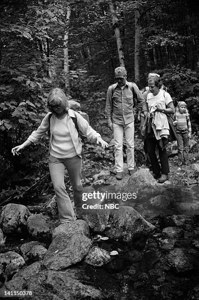 Air Date -- Pictured: Host actress Joanne Woodward, husband actor Paul Newman, producer Lee Mendelson in the White Mountain National Forest near...