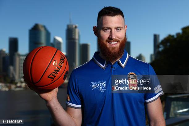 Aaron Baynes poses after signing with NBL team the Brisbane Bullets on a two year deal, at Kangaroos Point on July 29, 2022 in Brisbane, Australia.