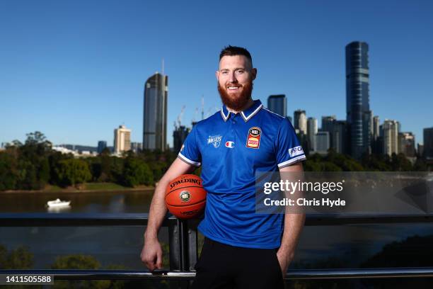 Aaron Baynes poses after signing with NBL team the Brisbane Bullets on a two year deal, at Kangaroos Point on July 29, 2022 in Brisbane, Australia.