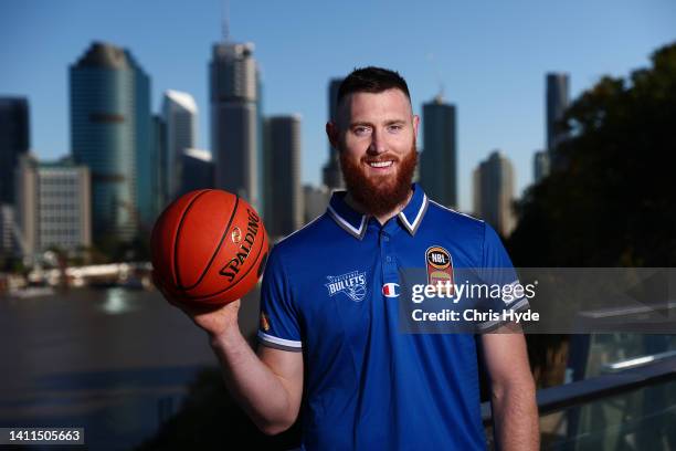 Aaron Baynes poses after signing with NBL team the Brisbane Bullets on a two year deal, at Kangaroos Point on July 29, 2022 in Brisbane, Australia.