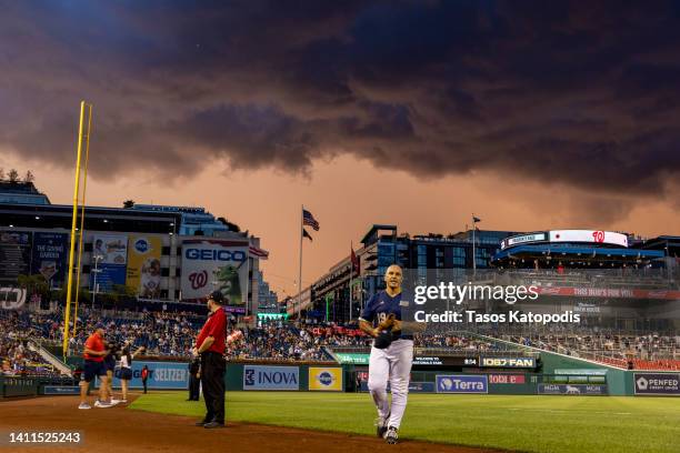 Players exit the field during the rain delay at the Congressional Baseball Game for Charity at Nationals Park July 28, 2022 at Nationals Park in...