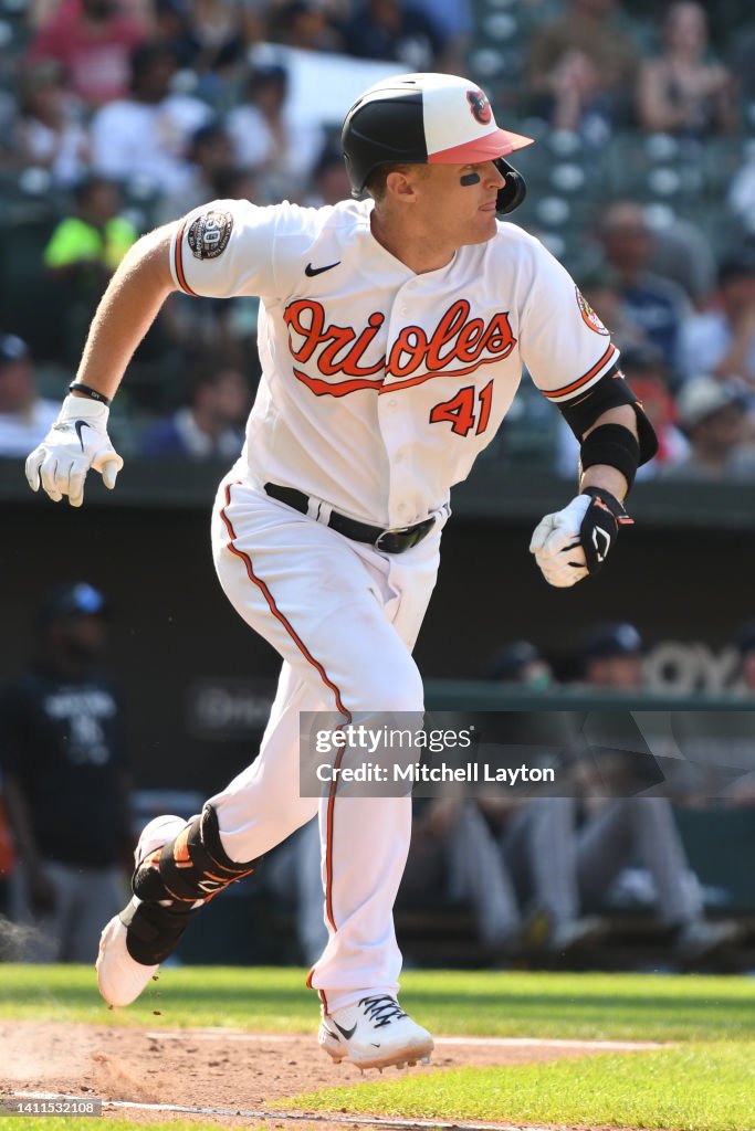 Tyler Nevin of the Baltimore Orioles runs to first base during a