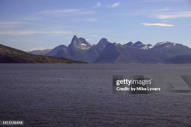 distant view of stetind from the skarberget ferry - stetind stock pictures, royalty-free photos & images