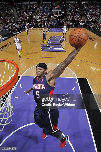 Josh Smith of the Atlanta Hawks dunks the ball against the Sacramento Kings on March 11, 2012 at Power Balance Pavilion in Sacramento, California....