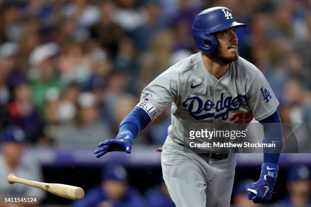 Cody Bellinger of the Los Angeles Dodgers hits a two RBI double against the Colorado Rockies in the fourth inning at Coors Field on July 28, 2022 in...