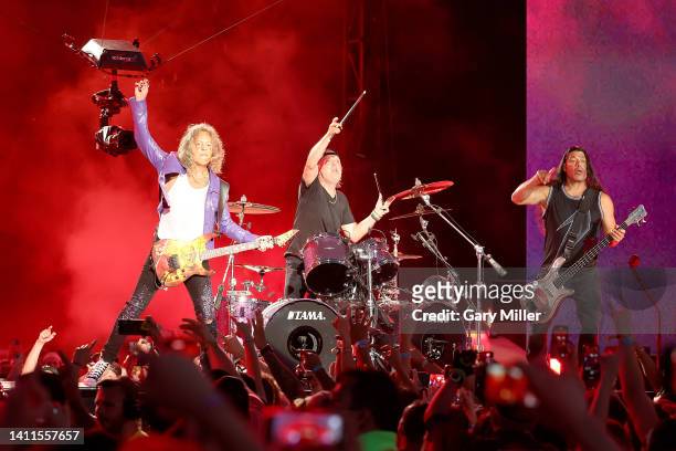 Kirk Hammett, Lars Ulrich and Robert Trujillo of Metallica performs in concert during day 1 of Lollapalooza at Grant Park on July 28, 2022 in...