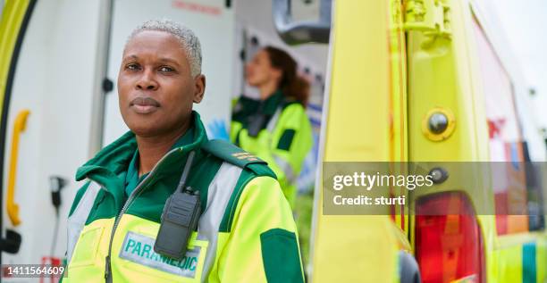 ambulance paramedic portrait - paramedic uniform stock pictures, royalty-free photos & images