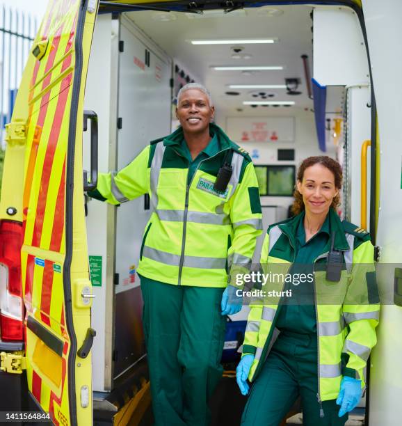 ambulance team portrait - paramedic portrait stock pictures, royalty-free photos & images