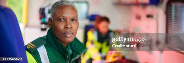 ambulance paramedic portrait - paramedic uk stock pictures, royalty-free photos & images