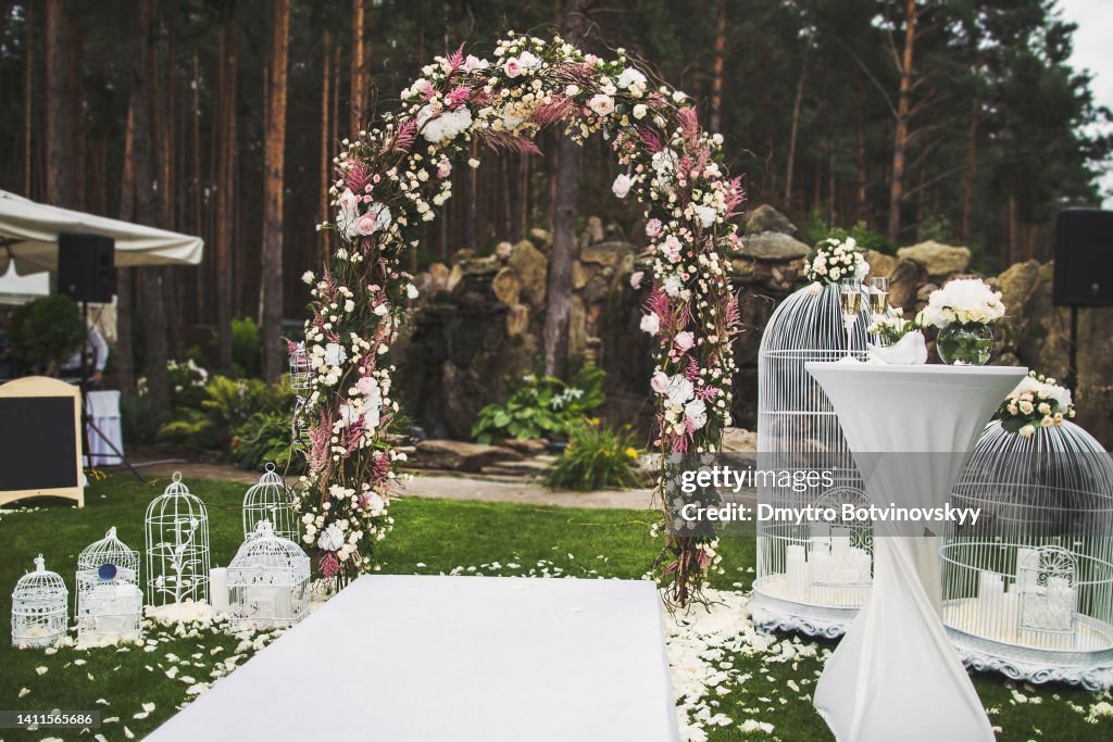 Outdoor wedding ceremony in a green garden