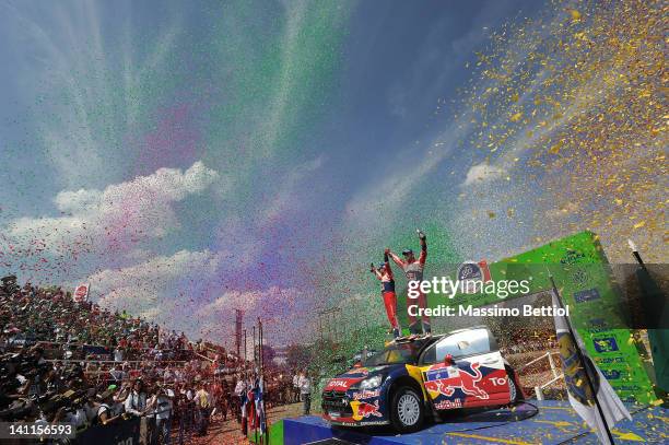 Sebastien Loeb of France and Daniel Elena of Monaco celebrate their victory during day three of the WRC Rally Mexico on March 11, 2012 in Leon,...