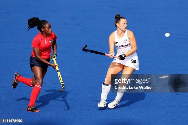 Vivian Onyango of Team Kenya competes with Rose Tynan of Team New Zealand during Women's Hockey - Women's Pool B on day one of the Birmingham 2022...