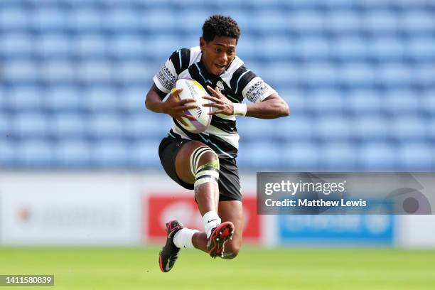 Ana Maria Naimasi of Team Fiji carries the ball during the Women's Rugby Sevens Pool B match between Team Fiji and Team Scotland on day one of the...