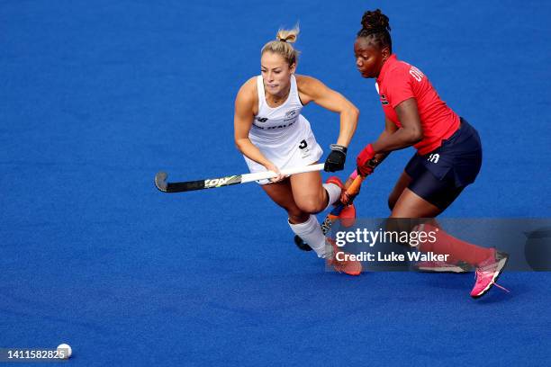 Alex Lukin of Team New Zealand competes with Gilly Okumu of Team Kenya during Women's Hockey - Women's Pool B on day one of the Birmingham 2022...