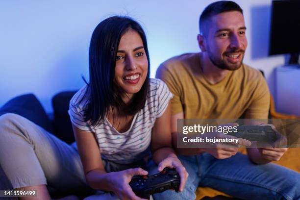 Free Photo  Boyfriend and girlfriend playing video games with