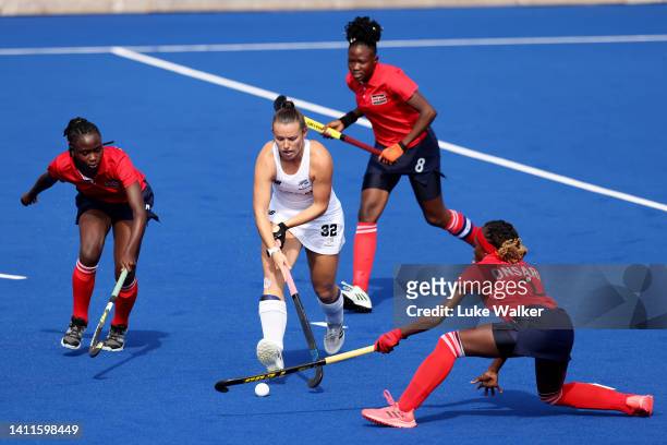 Rose Tynan of Team New Zealand competes with Jeriah Onsare of Team Kenya during Women's Hockey - Women's Pool B on day one of the Birmingham 2022...