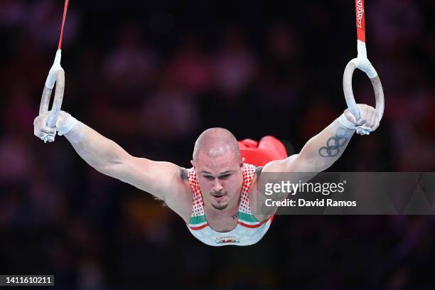 Brinn Bevan of Team Wales competes on the rings during the Men's Team and Individual Artistic Gymnastic Qualification on day one of the Birmingham...