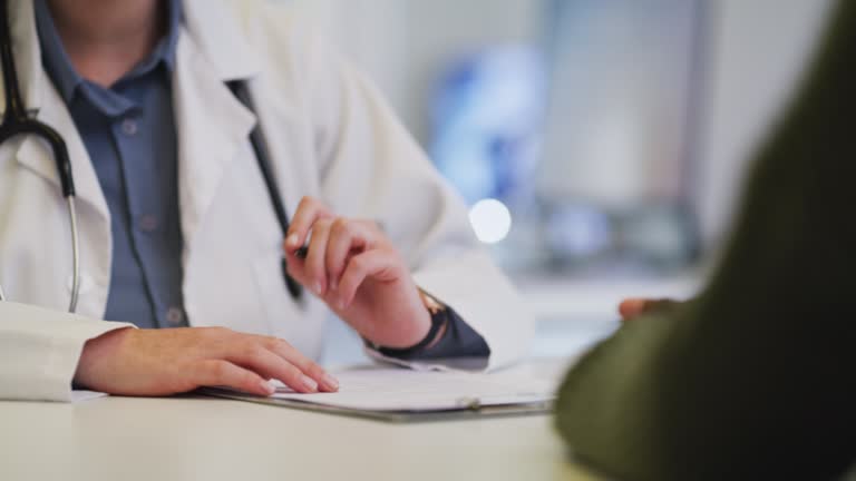 Doctor Writing A Script 253 Doctor Writing Script For Patient Stock Videos, Footage, & 4K Video ...