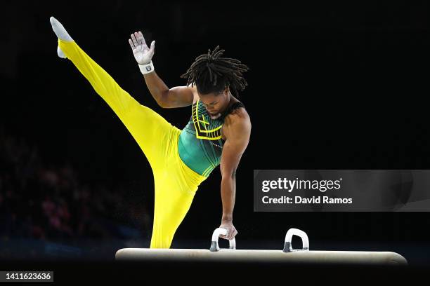 Michael Reid of Team Jamaica competes on the pommel horse during the Men's Team and Individual Artistic Gymnastic Qualification on day one of the...