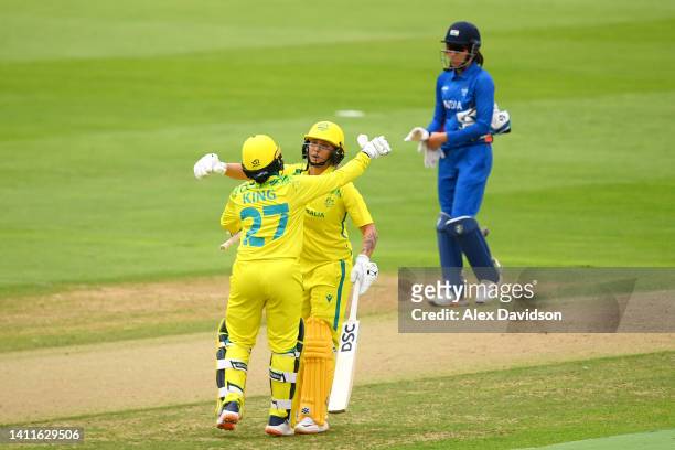 Alana King and Ash Gardner of Team Australia celebrates their side's victory after the Cricket T20 Preliminary Round Group A match between Team...