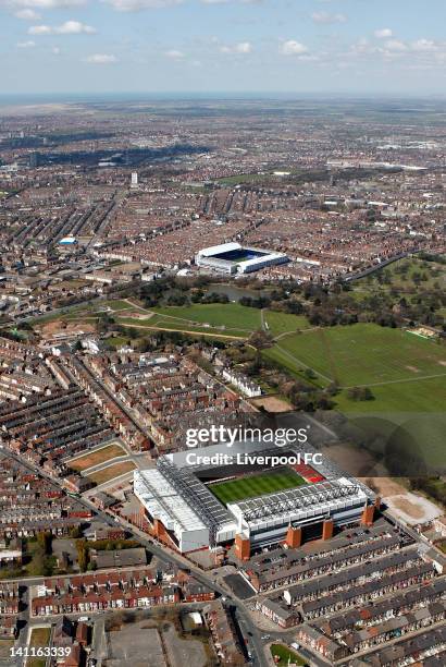 An aerial view of the Stadiums of Liverpool FC and Everton FC, Anfield and Goodison Park, seperated by Stanley Park and Anfield cemetery with the...