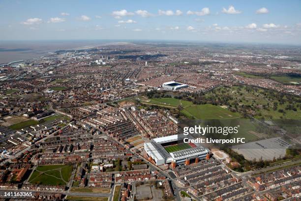 An aerial view of the Stadiums of Liverpool FC and Everton FC, Anfield and Goodison Park, seperated by Stanley Park and Anfield cemetery with the...
