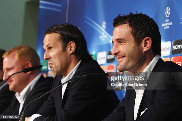 Alexander Frei, Marco Streller and head coach Heiko Vogel attend a FC Basel press conference ahead of their UEFA Champions League Round of 16 second...