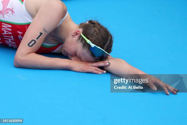 Olivia Mathias of Team Wales reacts after crossing the finish line in the Women's Individual Sprint Distance Triathlon Final on day one of the...