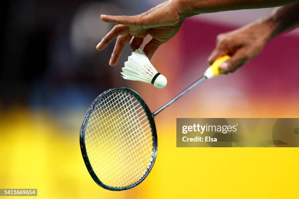 Niluka Karunaratne of Team Sri Lanka prepares to serve during Badminton - Men's Singles Group Play Stage - Group A match between Australia and Sri...