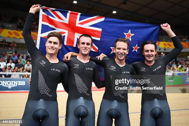 Gold Medalists, Aaron Gate, Campbell Stewart, Jordan Kerby and Nicholas Kergozou de la Boessiere of Team New Zealand pose for a photo after finishing...