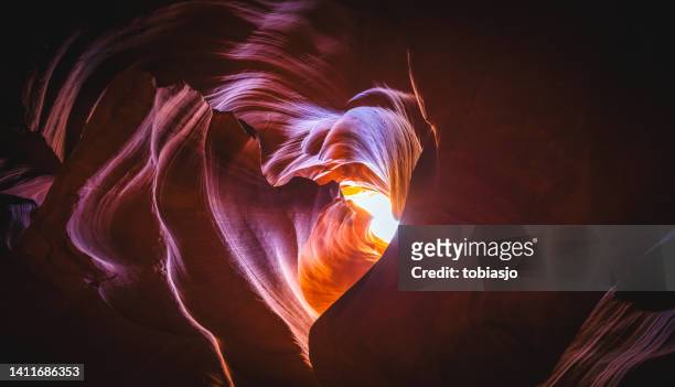 heart shape inside the antelope canyon - glowing heart stock pictures, royalty-free photos & images