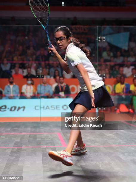 Anahat Singh of Team India plays a shot against Jada Ross of Team Saint Vincent and the Grenadines during the Men's/Women's Singles Round of 64 Match...