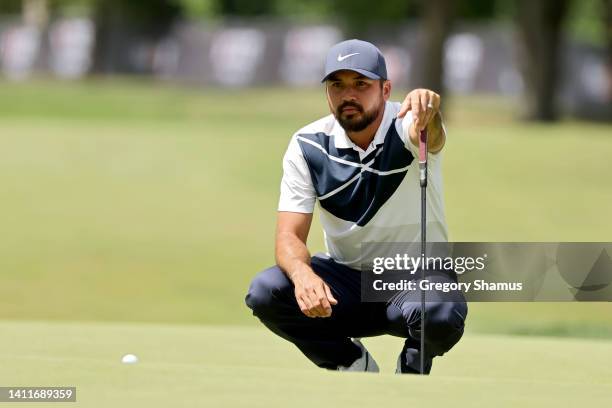 Jason Day of Australia lines up a putt on the eighth green during the second round of the Rocket Mortgage Classic at Detroit Golf Club on July 29,...