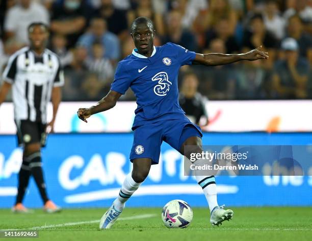 Ngolo Kante of Chelsea runs with the ball during the pre-season friendly between Chelsea and Udinese Calcio at Dacia Arena on July 29, 2022 in Udine,...