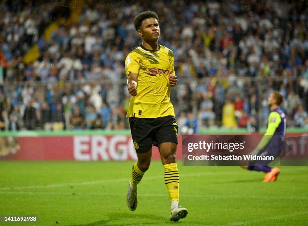 Karim Adeyemi of Borussia Dortmund celebrates after scoring their team's third goal during the DFB Cup first round match between TSV 1860 München and...