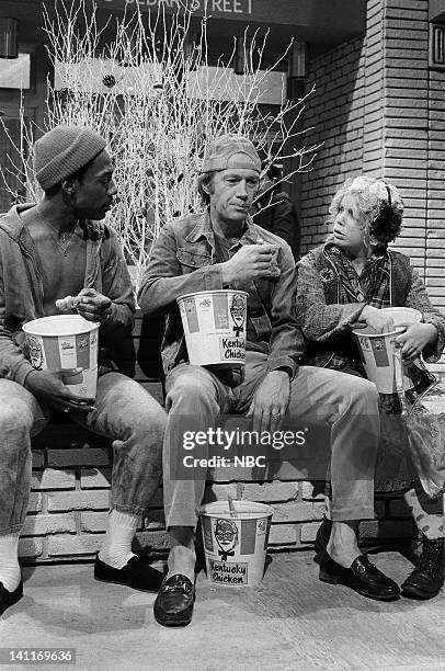 Episode 5 -- Pictured: Eddie Murphy as Guy, David Carradine as Guy, Denny Dillon as Woman during the 'KFC Lovers' skit on December 20, 1980 -- Photo...