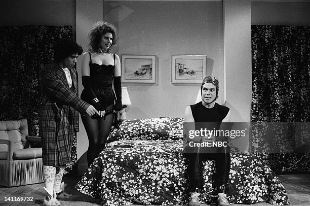 Episode 9 -- Pictured: Gilbert Gottfried as Larry, Ann Risley as Mother, Joe Piscopo as Father during the 'Parent & Child' skit on February 7, 1981...