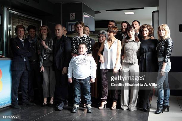 Director Ferzan Ozpetek poses with the cast during the "Magnifica Presenza" photocall at Adriano Cinema on March 12, 2012 in Rome, Italy.
