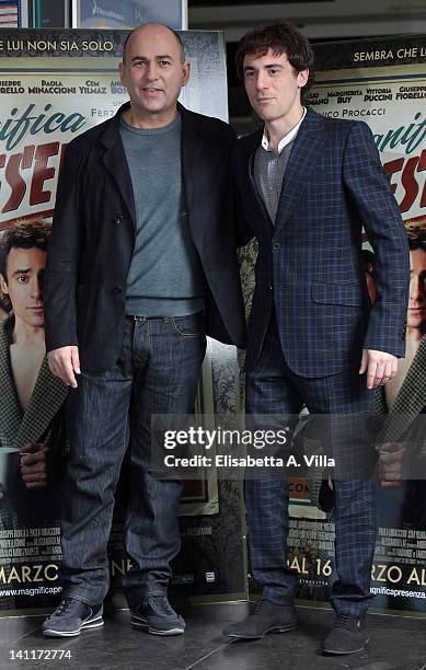 Director Ferzan Ozpetek and actor Elio Germano attend "Magnifica Presenza" photocall at Adriano Cinema on March 12, 2012 in Rome, Italy.