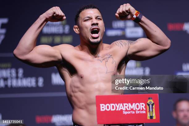 Drakkar Klose poses on the scale during the UFC 277 ceremonial weigh-in at American Airlines Center on July 29, 2022 in Dallas, Texas.